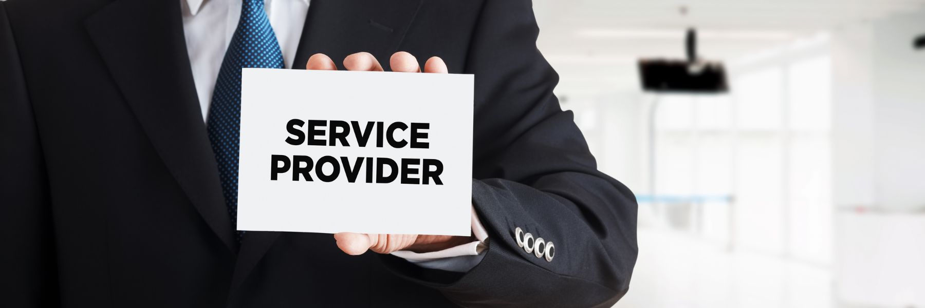 man holding sign reading Service Provider