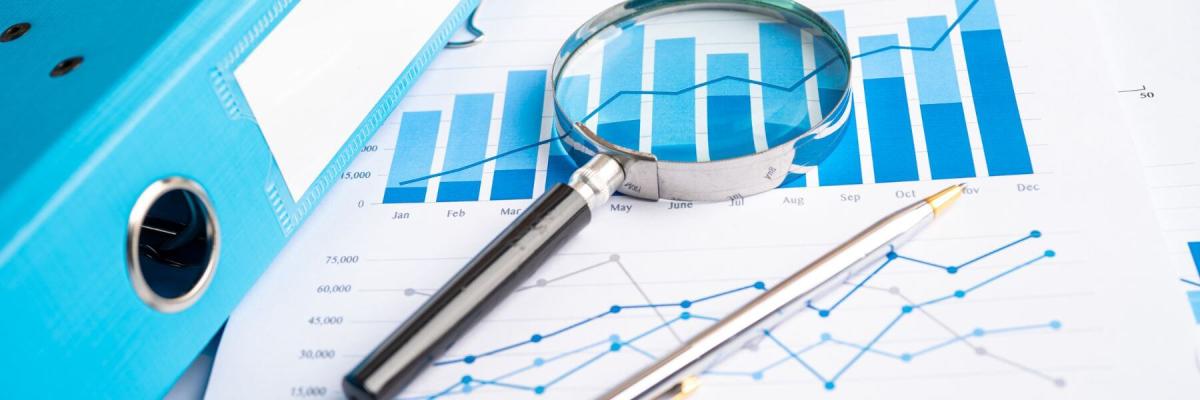 data on a paper with magnifying glass