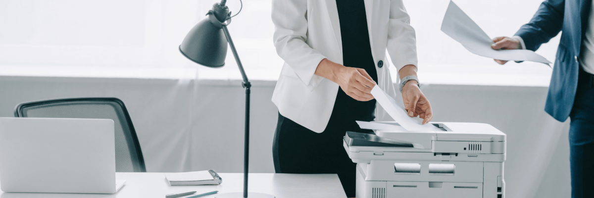 a woman using printer